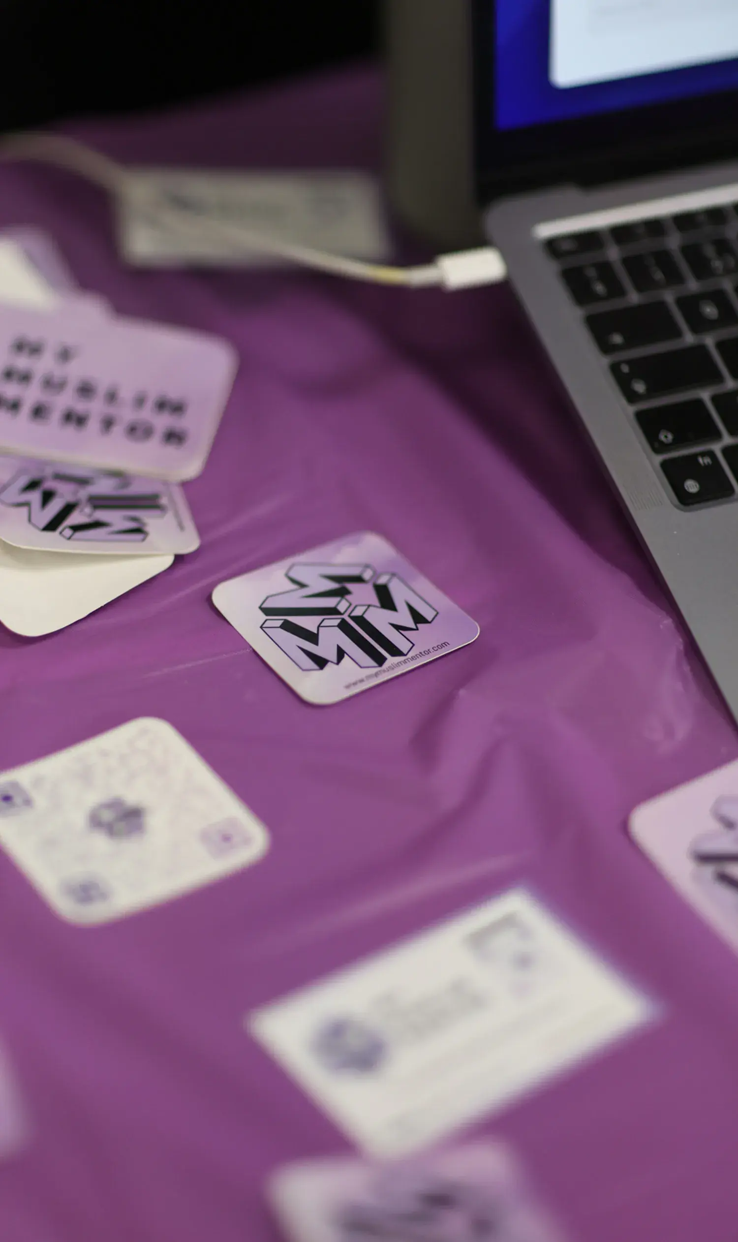 My Muslim Mentor stickers on a purple table