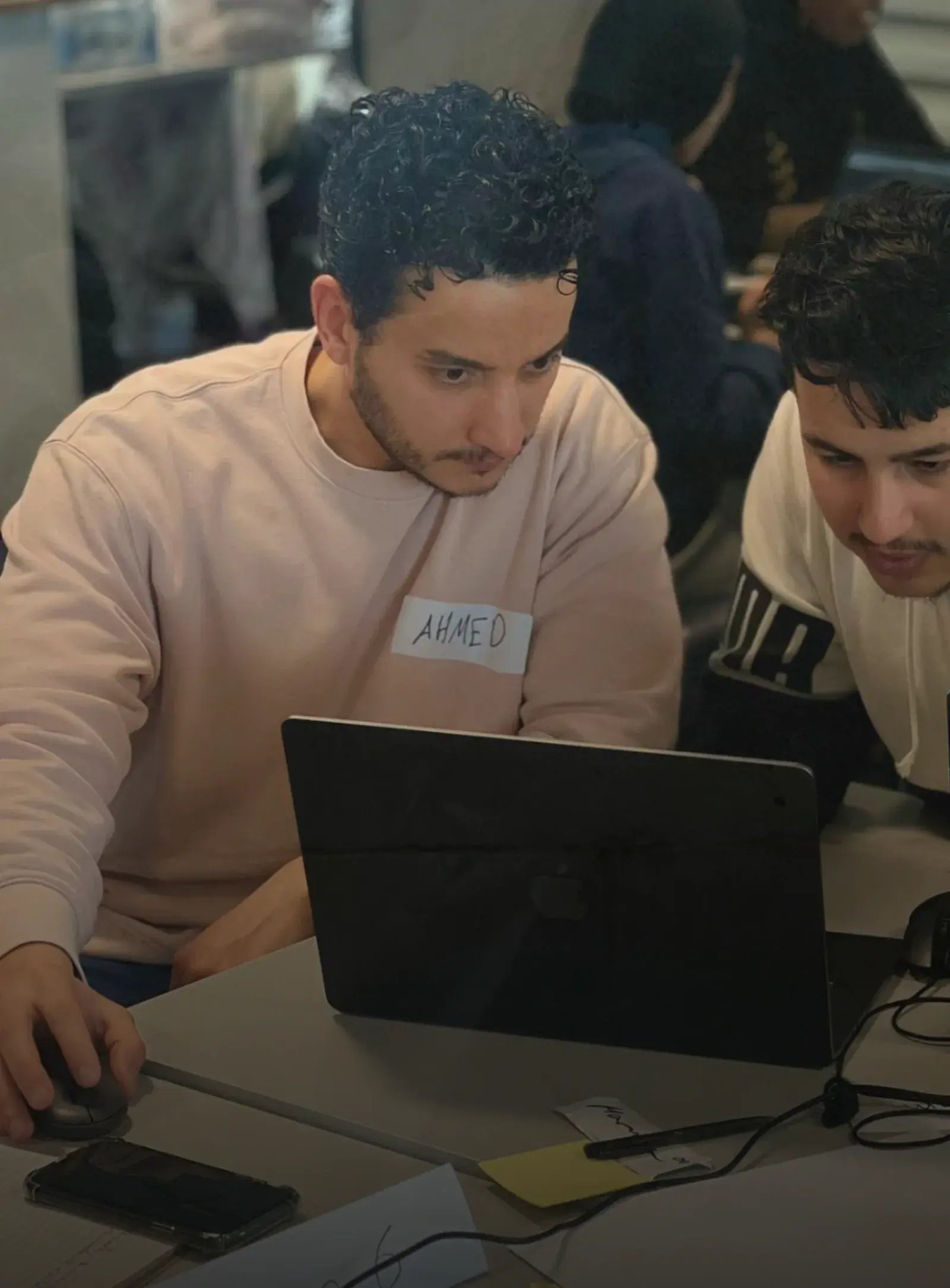 Students working together on a laptop