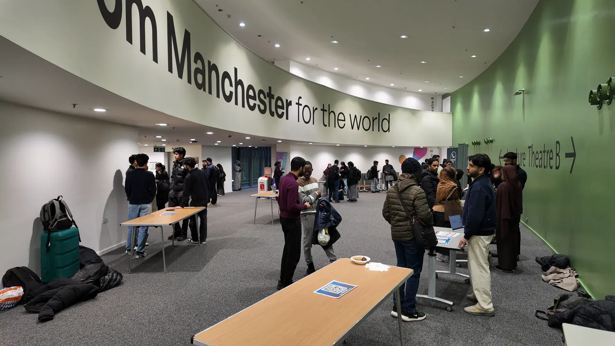 Students gathering in a University of Manchester foyer