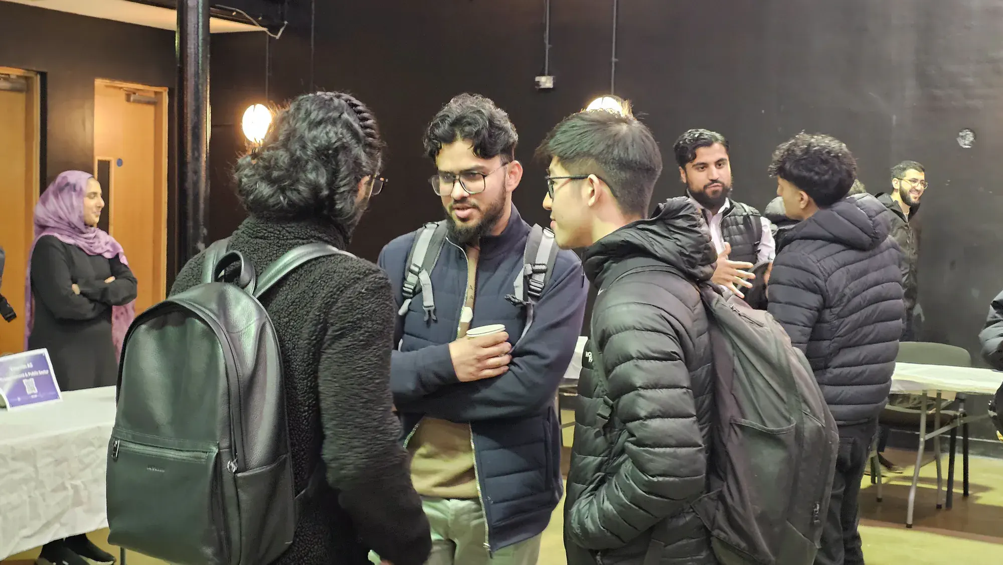 Students talking between conference sessions